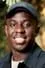 Melvin Kakooza como Sig selv