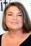 Mindy Cohn como Ann Holiday