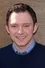 Nate Corddry como Larry Wilson