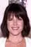 Neve Campbell como LeAnn Harvey
