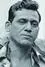Om Puri como Mr de Souza