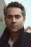 Omar Metwally como Dr. Hugh Alberness