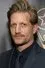 Paul Sparks como Thomas Yates
