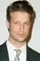 Peter Scanavino como Dominick 'Sonny' Carisi Jr.