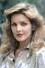 Priscilla Presley como Nurse Benson