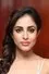 Priya Banerjee como Nora