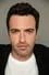 Reid Scott como Brian