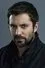 Rhys Coiro como Ari Adamian
