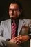 Riezman Khuzaimi como Tan Sri Hisham