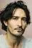 Rik Young como Armando Castillo
