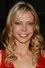 Riki Lindhome como Janet Carney