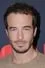 Ryan Carnes como Justin