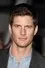 Ryan McPartlin como Devon Woodcomb