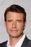 Scott Foley como Henry Burton
