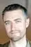 Sean Gunn como 