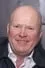 Steve McFadden como Phil Mitchell