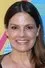 Suzanne Cryer como Nicole