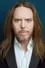 Tim Minchin como Darius Cracksworth