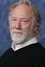 Timothy Busfield como John Garner