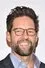 Todd Grinnell como Dr. Alex Cominis