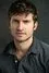 Tom Weston-Jones como Merthin
