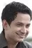 Umesh Kamat como H.V. Kamath