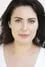 Yasmine Akram como Nora Garvey