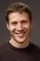 Zach Gilford como Gregg