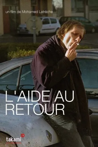 Póster de L'Aide Au Retour